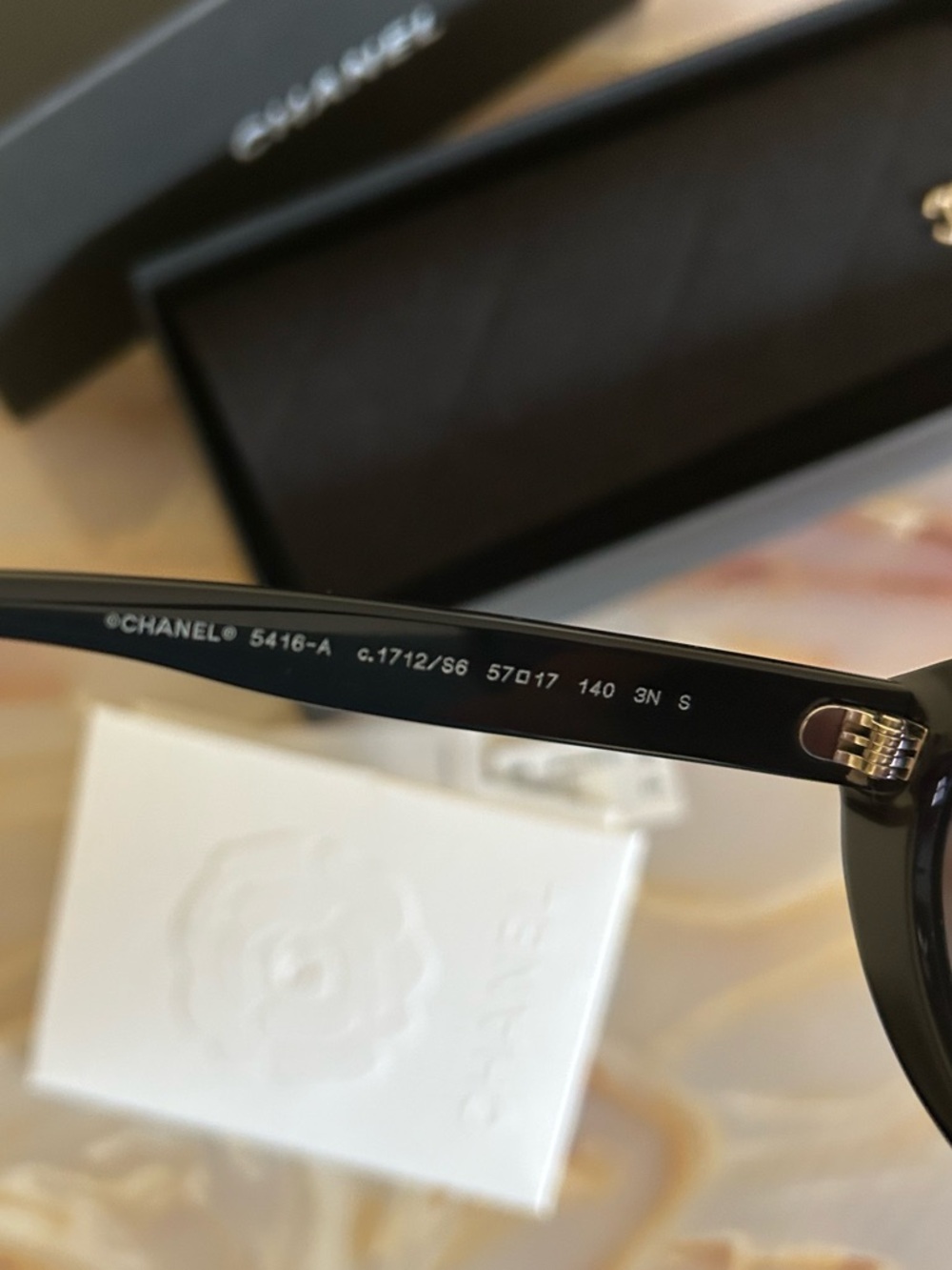 CHANEL Black Gloss Oval Sunglasses with Gold CC Temples - Picture 7 of 12